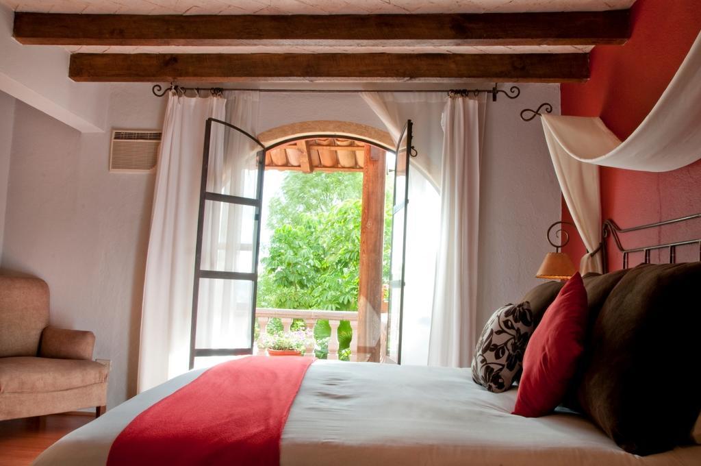 Coqueta Hotel Boutique ซานมิเกล เด อาเญนเด ห้อง รูปภาพ